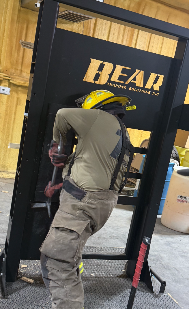 The Bear Breaching Door