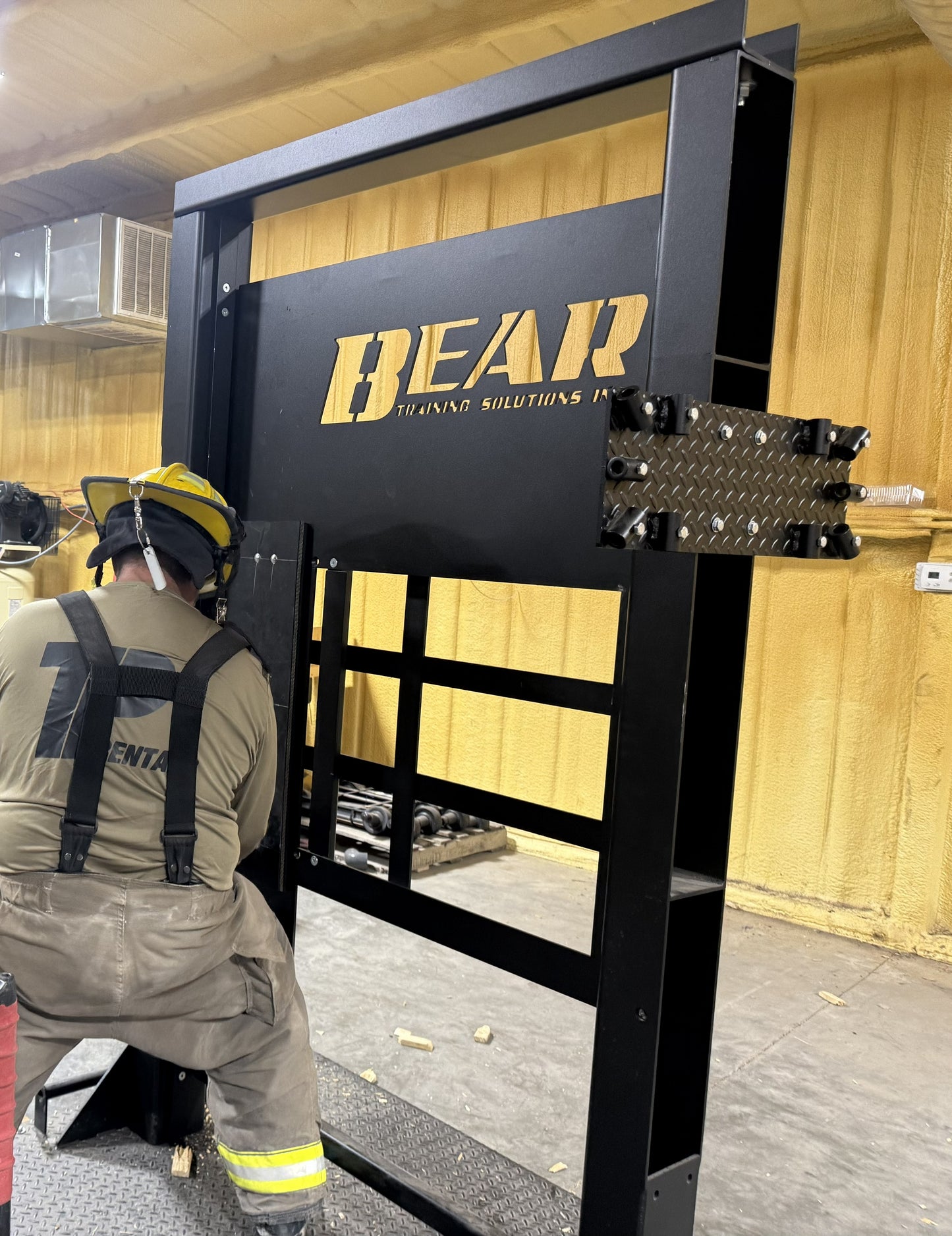 The Bear Breaching Door